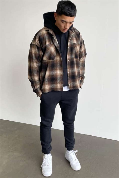 flannel over hoodie streetwear.